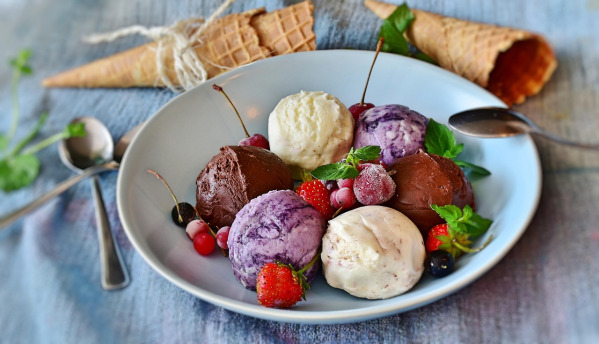 romanian dessert papanasi with jam and cream